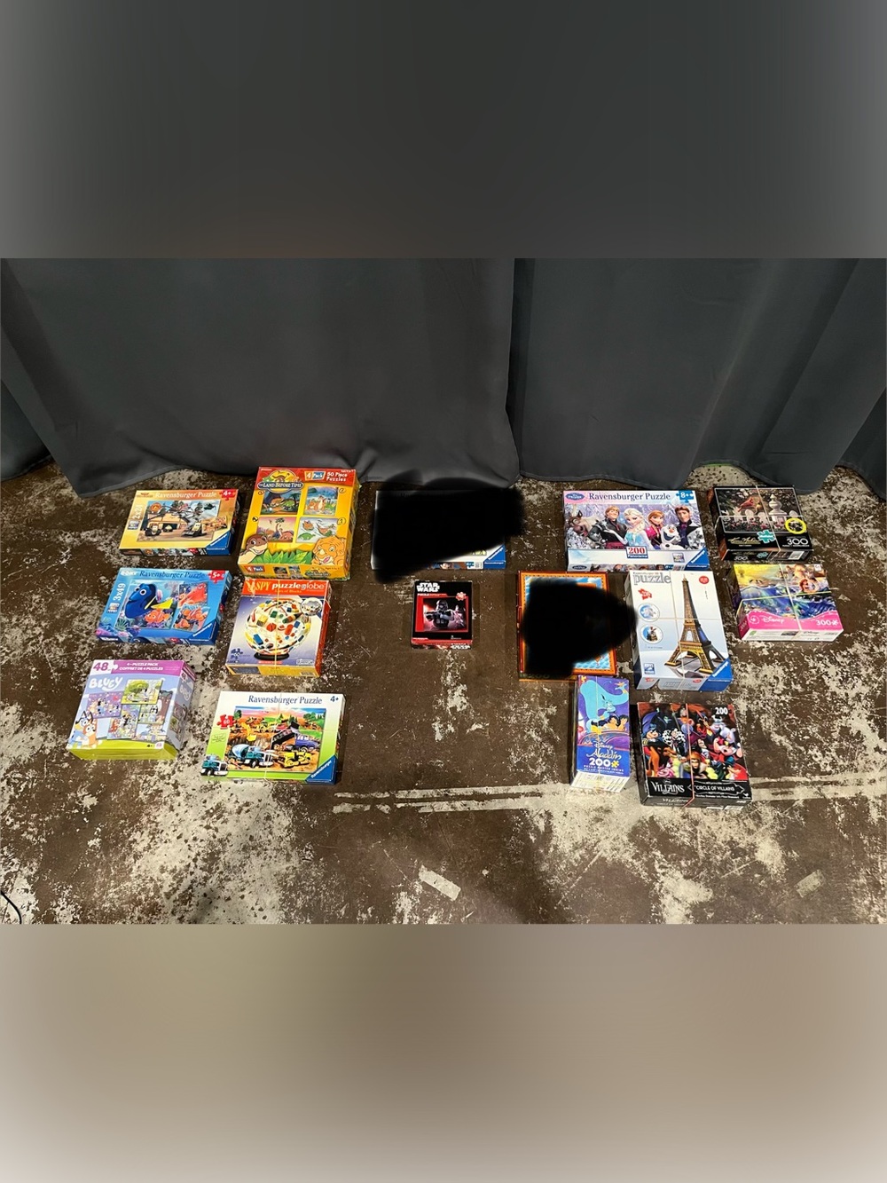 Lot of 14 48-300 piece jigsaw puzzles.